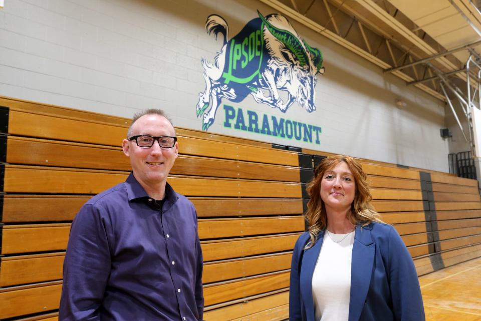 Paramount School of Excellence Chief Executive Officer Tommy Reddicks, left, and Nikki Tredway, principal of the South Bend charter school, stand in the gym Friday, March 10, 2023, at the former Tarkington Traditional School on Hepler Street in South Bend. The new school will open to students in the fall.