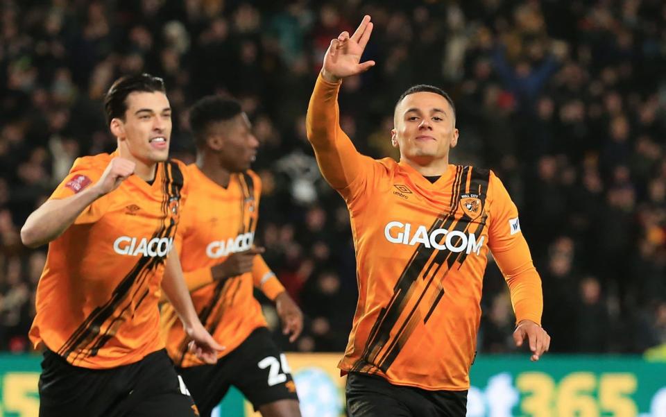 Hull City's English striker Tyler Smith (R) celebrates after scoring the opening goal of the English FA Cup third round football match between Hull City and Everton at the MKM Stadium in Kingston upon Hull, north east England on January 8, 2022. - AFP