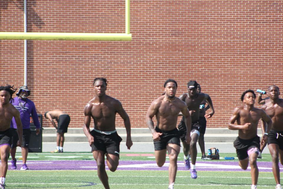 Calvary Day's Thomas Blackshear (left) and Doopah Coleman face off in races to close out a Calvary Day practice in June 2024.