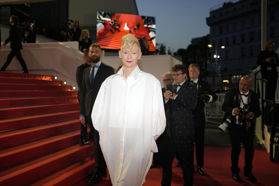 Tilda Swinton poses for photographers upon arrival at the premiere of the film 'R.M.N.' at the 75th international film festival, Cannes, southern France, Saturday, May 21, 2022. (AP Photo/Petros Giannakouris)