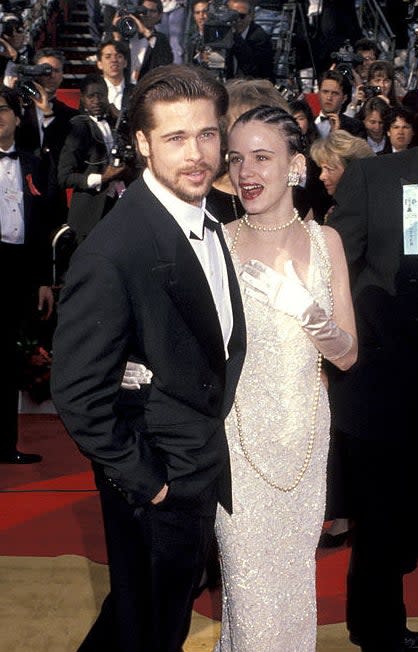 Juliette Lewis and Brad Pitt at a red carpet event in the '90s