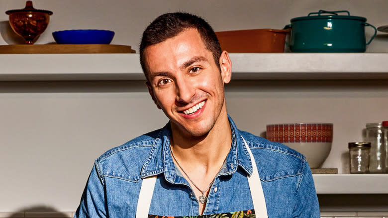 Jake Cohen smiling in kitchen