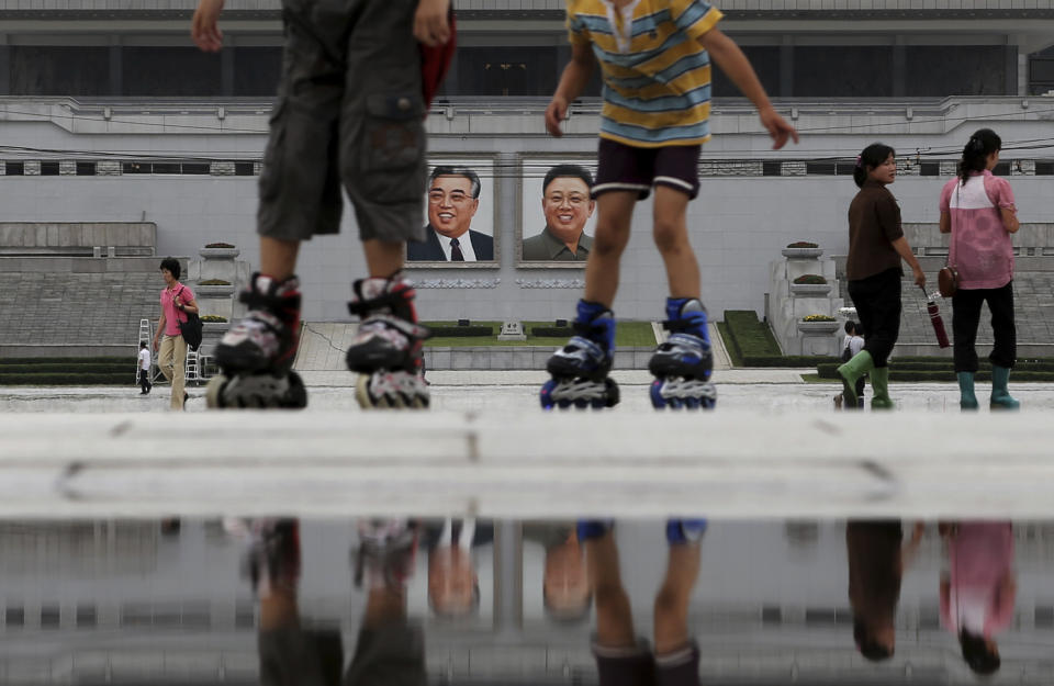 FILE - Children skate around the Kim Il Sung Square on Sunday, July 21, 2013, downtown Pyongyang, North Korea. With a U.S. soldier crossing the border into North Korea at the border town of Panmunjom on Tuesday, July 18, 2023, and in custody this week, talk turns to the nation itself — a country that is known for its suspicion of outsiders but also rejects frequent descriptions of it as reclusive. (AP Photo/Wong Maye-E, File)