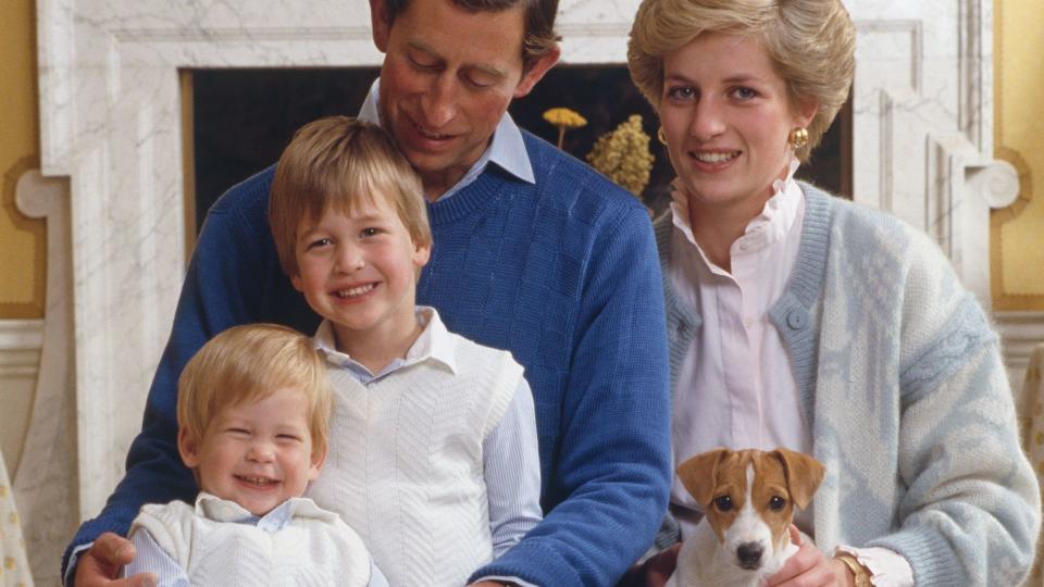 family posing for photo inside 