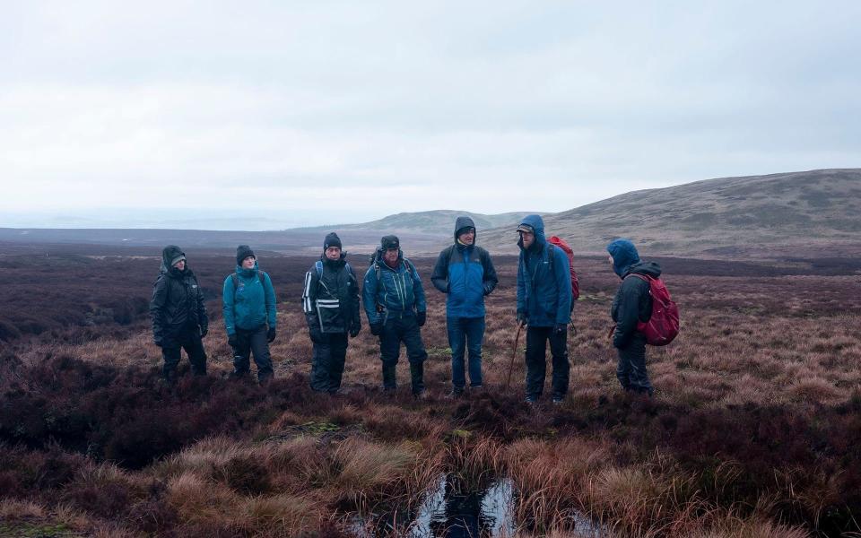 Inspecting a peat dam in the rain, Telegraph Journalist Joe Shute meets with members from The Moors For The Future Partnership - Alixandra Fazzina