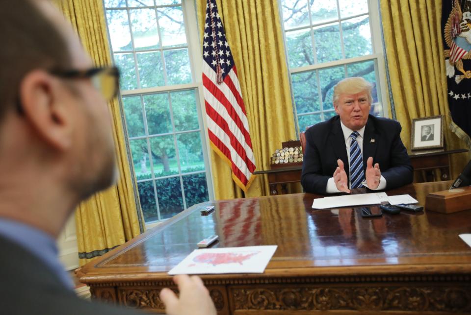 U.S. President Donald Trump speaks during an interview with Reuters in the Oval Office of the White House in Washington, U.S., April 27, 2017. REUTERS/Carlos Barria