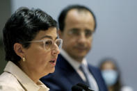 Spain's Foreign Minister Arancha Gonzalez Laya, left, talks during a news conference with her Cypriot countepart Nikos Christodoulides at the Cypriot Foreign Ministry building in the capital Nicosia, Cyprus, on Wednesday, Sept. 30, 2020. Laya said her visit aimed to convey her country's solidarity with Cyprus amid tensions over a Turkish gas search in waters were Cyprus claims exclusive economic rights. (AP Photo/Petros Karadjias)