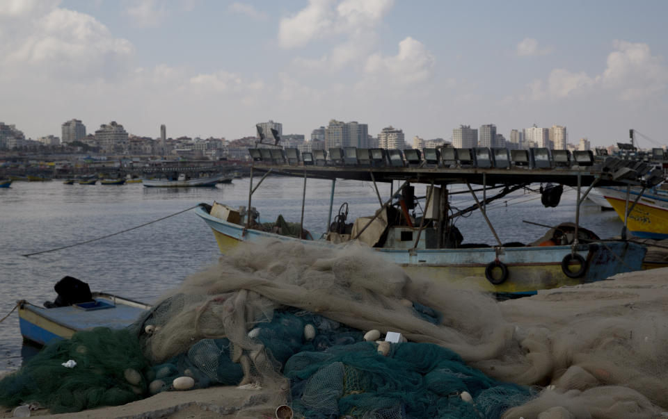 Palestinian fishing boats moored in the Gaza seaport in Gaza City, Thursday, June 13, 2019. The Israeli military took the rare step of closing the Gaza Strip's offshore waters to Palestinian fishermen Wednesday until further notice in response to incendiaries launched into Israel in recent days. (AP Photo/Hatem Moussa)