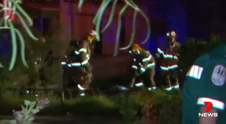 The moment paramedics pulled the pensioner out of his burning house. Source: 7 News