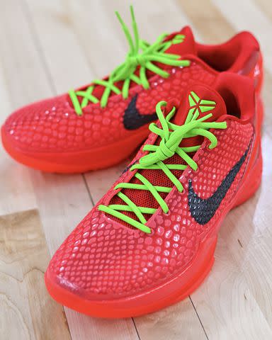 <p>USC Men's Basketball X</p> Nike Kobe 6 protro "Reverse Grinch" sneakers