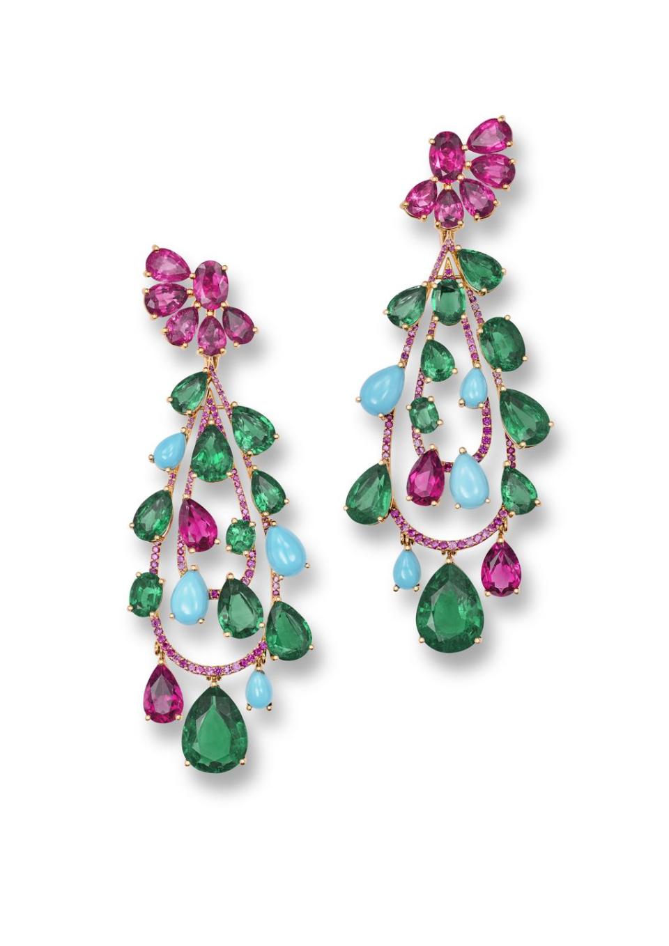 a pair of earrings with colorful beads