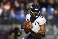 Denver Broncos quarterback Russell Wilson (3) looks to pass in the first half of an NFL football game against the Baltimore Ravens, Sunday, Dec. 4, 2022, in Baltimore. (AP Photo/Nick Wass)