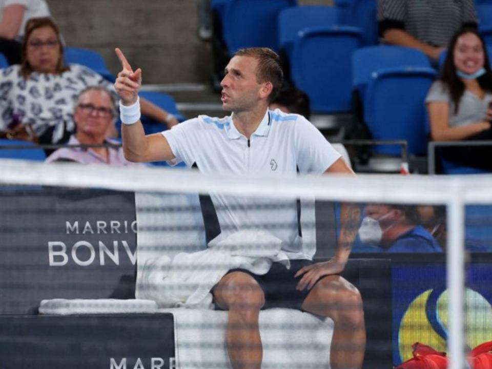 Dan Evans remonstrates with the umpire (AFP via Getty Images)