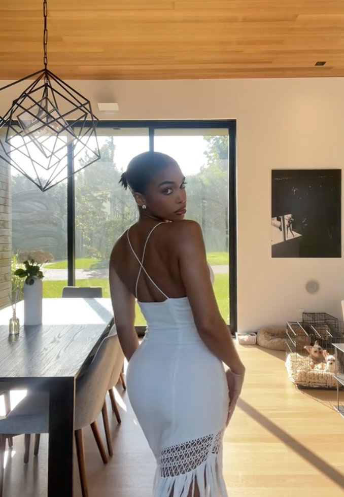 Lori Harvey wearing an all-white ensemble on her latest reel posted on July 3, on TikTok.