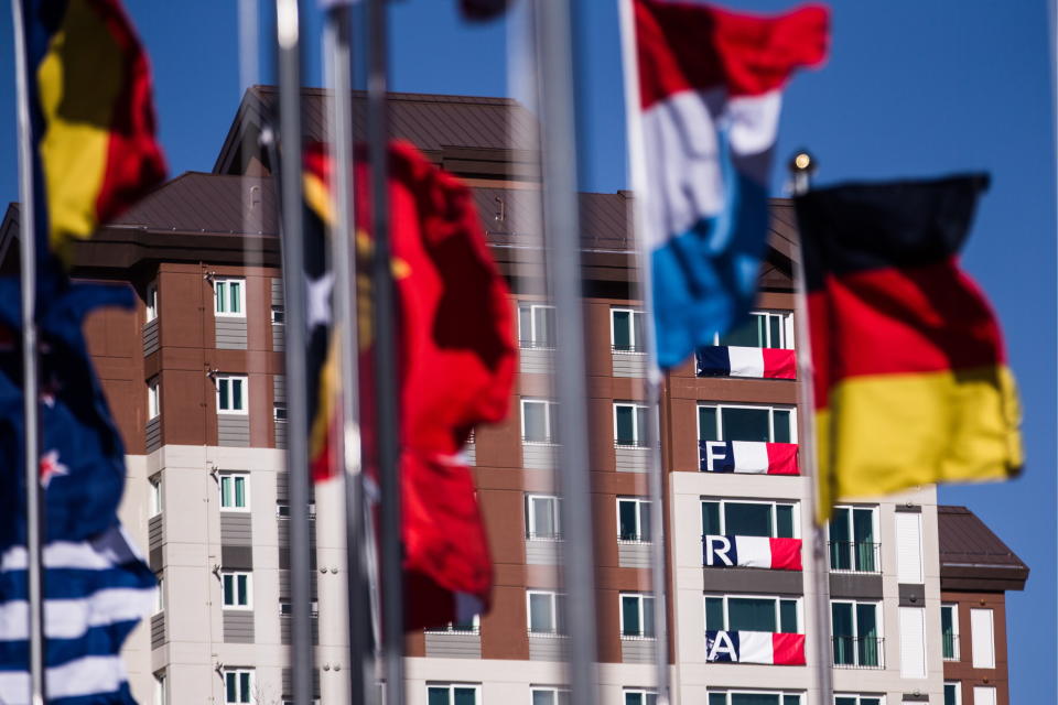 <p>The national flags hoisted in the Olympic Village ahead of the 2018 Winter Olympic Games. (Sergei Bobylev\TASS via Getty Images) </p>