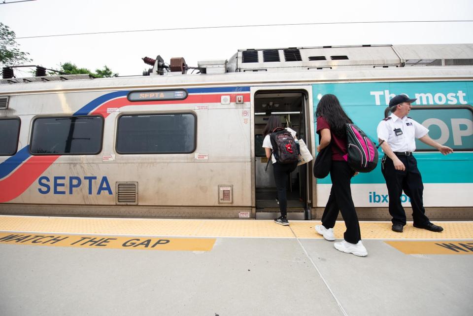 Passengers board a southbound train on SEPTA's West Trenton regional rail line at the Yardley station on Monday, June 12, 2023.