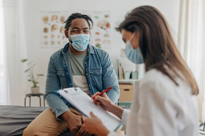 Patient and doctor talking in office