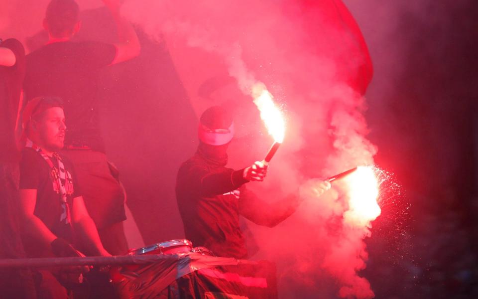 Rennes' fans light a flare - REUTERS/Stephane Mahe