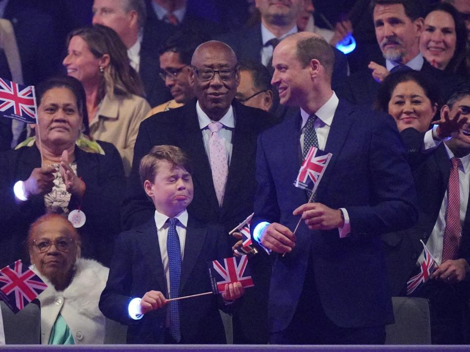Prince George and Prince William during the Coronation Concert held at Windsor Castle on May 7, 2023 in Windsor, England.