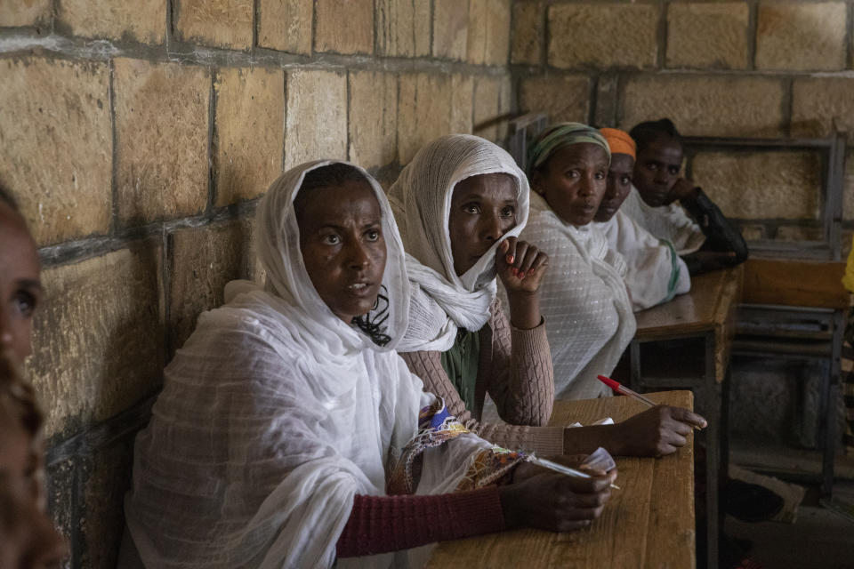 People displaced by the recent conflict listen as Manuel Fontaine, UNICEF Director of the Office of Emergency Programmes visits internally-displaced people in Adigrat Town, in the Tigray region of northern Ethiopia Monday, Feb. 22, 2021. (Zerihun Sewunet/UNICEF via AP)