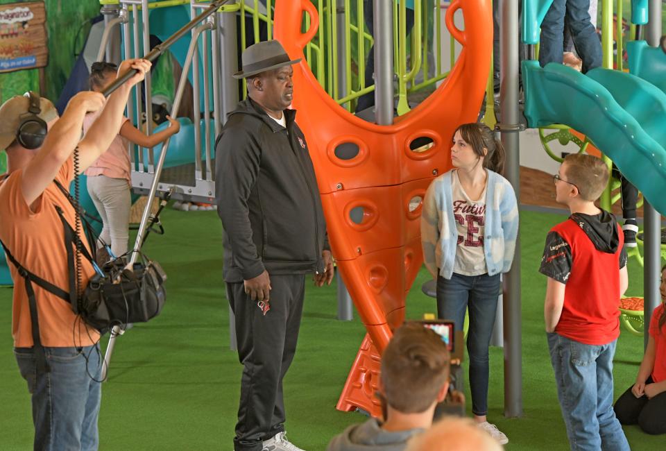 Former boxing heavyweight champion James "Buster" Douglas recites his lines during an anti-bullying commercial at the Buckeye Imagination Museum in Mansfield.