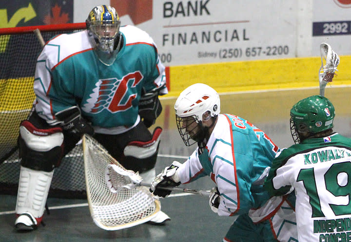 Colin Doyle was forced to don the goalie gear to help Six Nations to an 11-7 win in the Mann Cup with the two regular keepers ejected earlier in the game for illegal equipment (Gary Woodburn Photo)