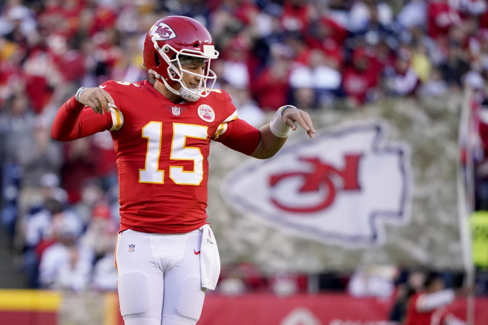 Kansas City Chiefs quarterback Patrick Mahomes celebrates after a Chiefs touchdown during the first half of an NFL football game against the Dallas Cowboys Sunday, Nov. 21, 2021, in Kansas City, Mo. (AP Photo/Ed Zurga)