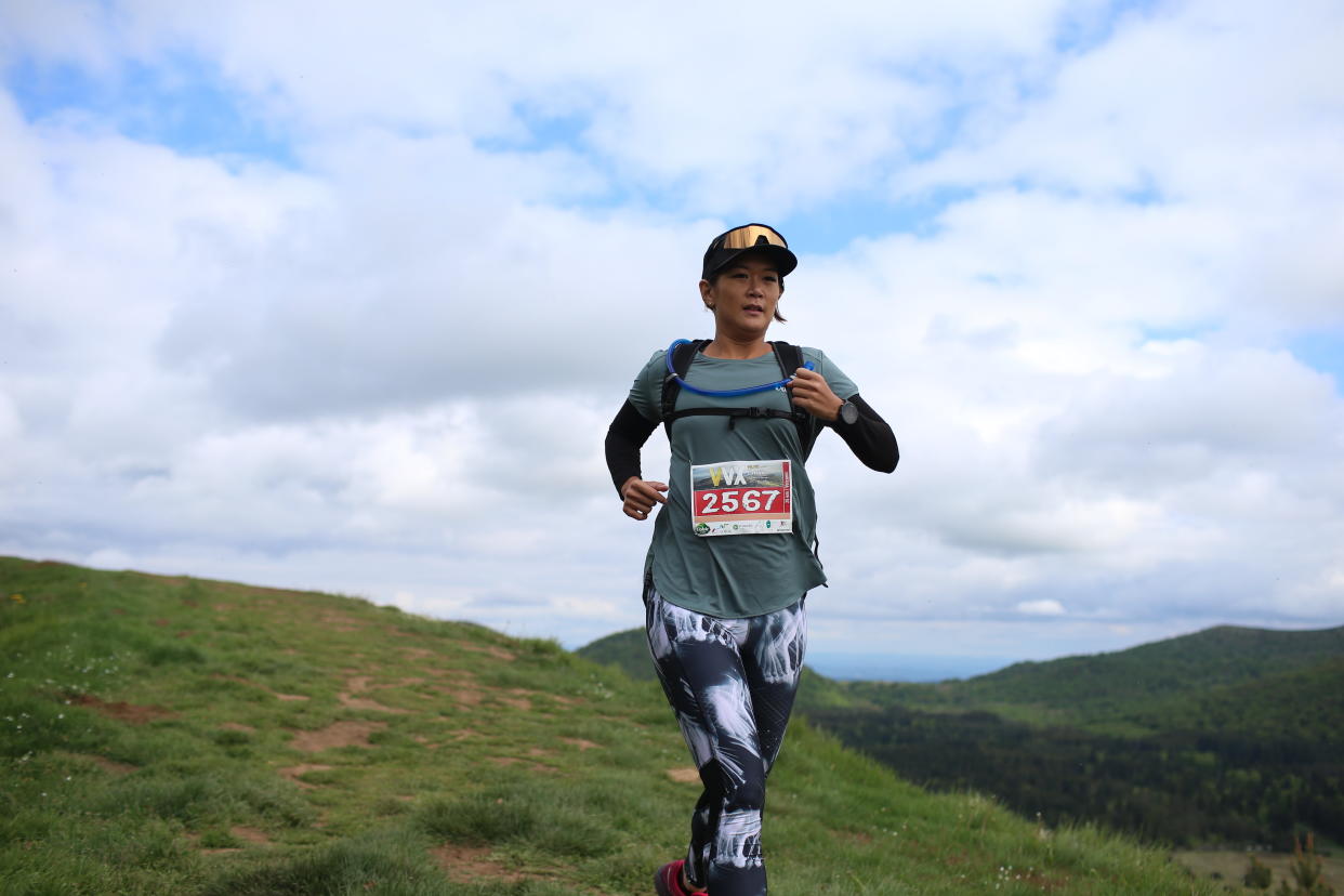 Writer Cheryl Tay running the Volvic Volcanic Experience trail race in France. (PHOTO: Volvic Asia)