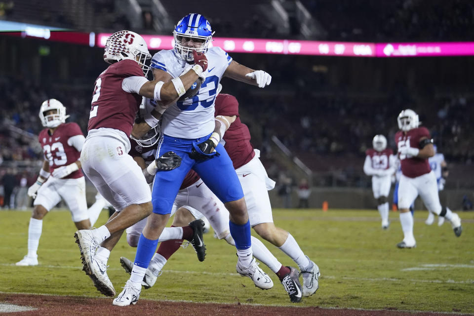 BYU tight end Isaac Rex (83) scores a touchdown against Stanford during the first half of an NCAA college football game in Stanford, Calif., Saturday, Nov. 26, 2022. (AP Photo/Godofredo A. Vásquez)