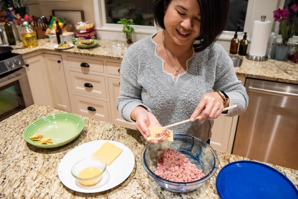 Jen Robinson, makes wontons in her Plumstead home on Thursday, January 19, 2023, in preparation for the Lunar New Year on Sunday. Following Chinese customs, her family celebrates for 15 days starting Saturday with a New Year's Eve dinner.