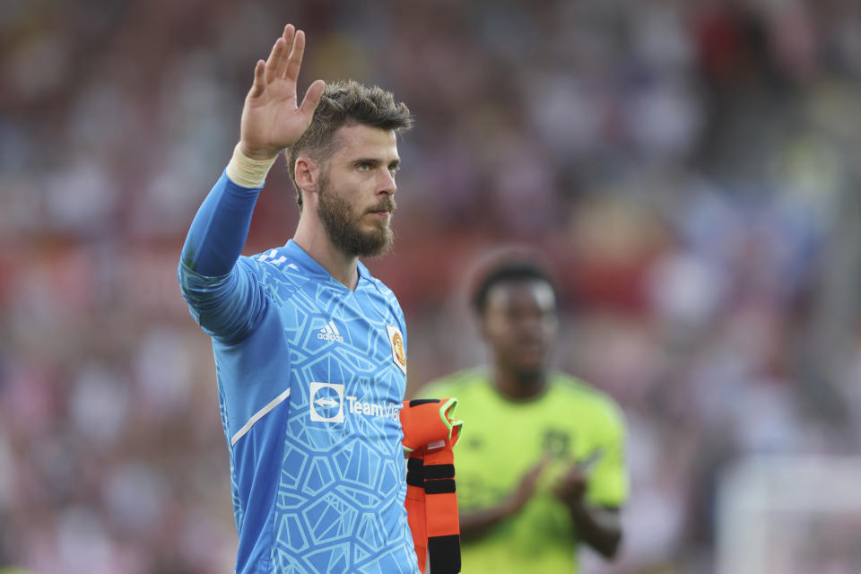 Manchester United's goalkeeper David de Gea waves to his team supporters after the end of the English Premier League soccer match between Brentford and Manchester United at the Gtech Community Stadium in London, Saturday, Aug. 13, 2022. Manchester United lost 0-4 .(AP Photo/Ian Walton)