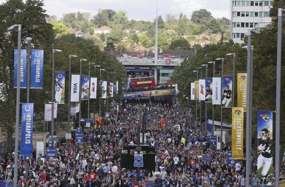 Fans line Wembley Way as they arrive for last year's Jaguars-Colts game in London. The Jags have routinely drawn more than 80,000 for each of their London games. (AP) 