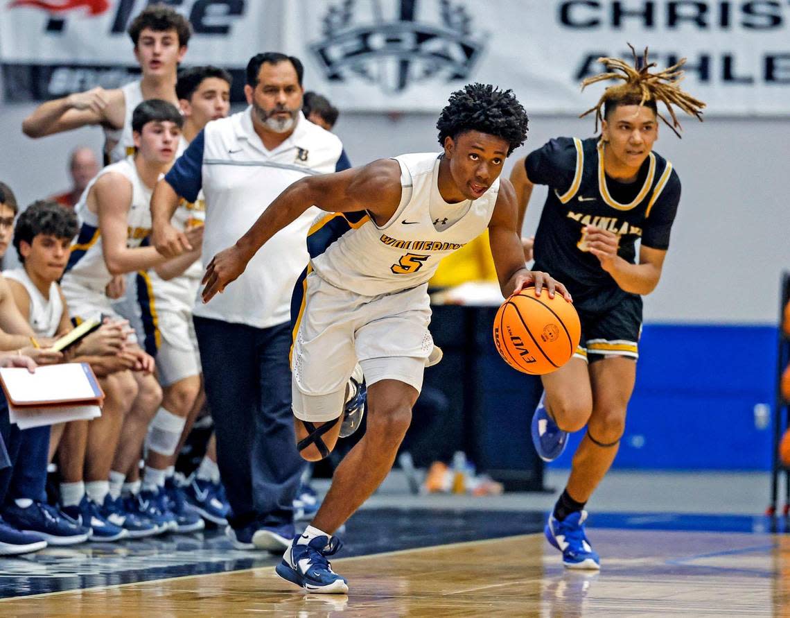 Belen Jesuit’s Bryce Fitzgerald (5) drives the ball in the game against Mainland during the FHSAA boys basketball Class 5A State Championship at the RP Funding Center in Lakeland, Florida on Saturday, March 4, 2023.
