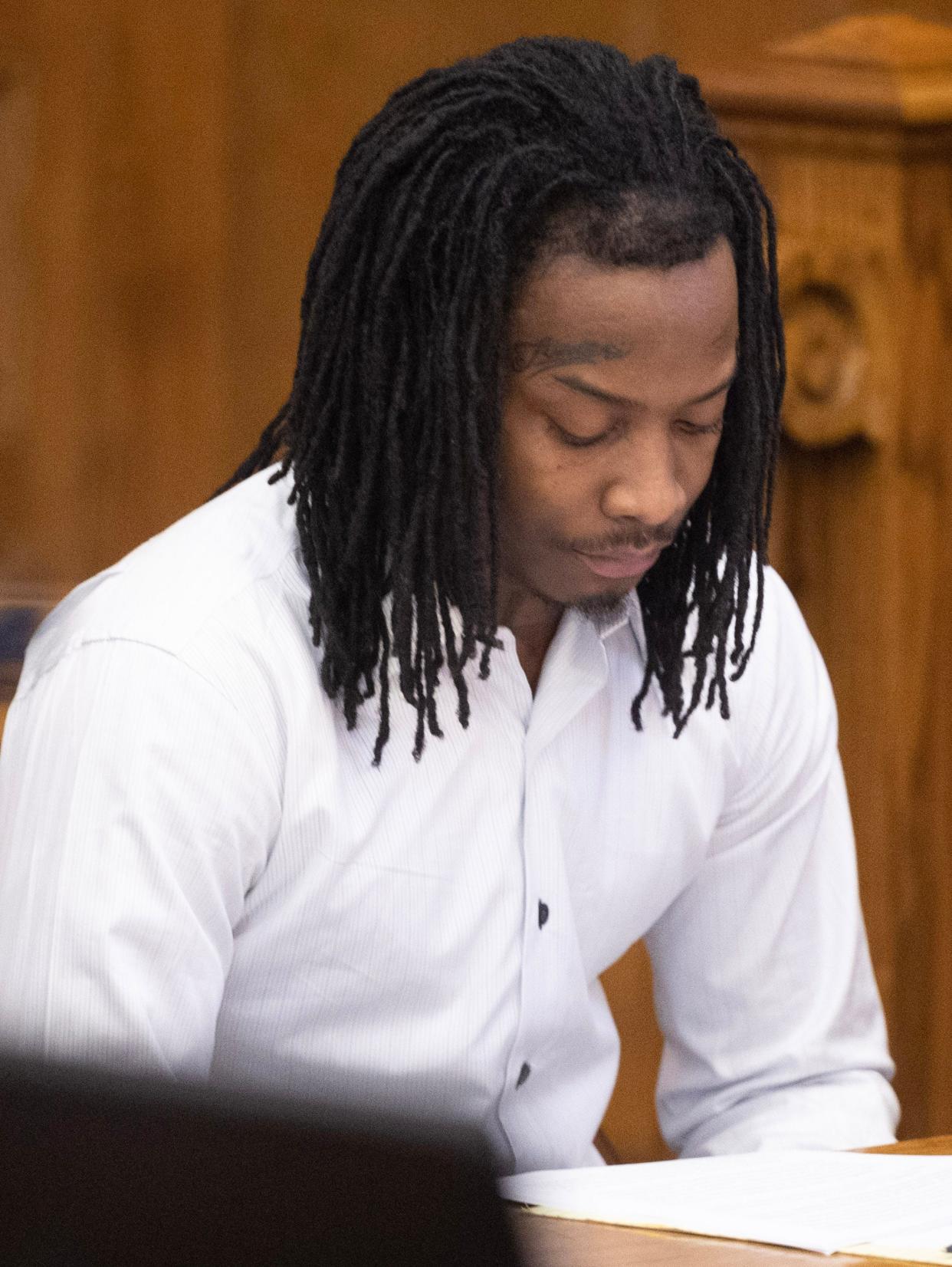 Jamaari Harper listens during his murder trial in Stark County Common Pleas Court on Wednesday, hours before a jury convicted him of killing Garry Marx Jr. on Feb. 6. Judge Kristin Farmer is scheduled to sentence him Friday.