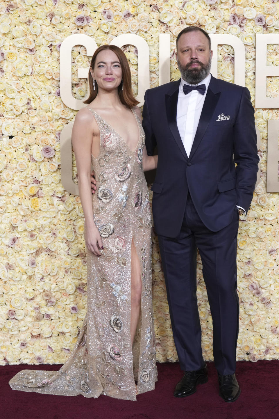 Emma Stone, left, and Yorgos Lanthimos arrive at the 81st Golden Globe Awards on Sunday, Jan. 7, 2024, at the Beverly Hilton in Beverly Hills, Calif. (Photo by Jordan Strauss/Invision/AP)