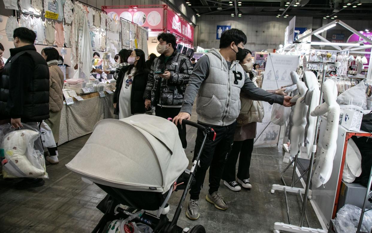 Visitors at a parenting expo in Ilsan, South Korea