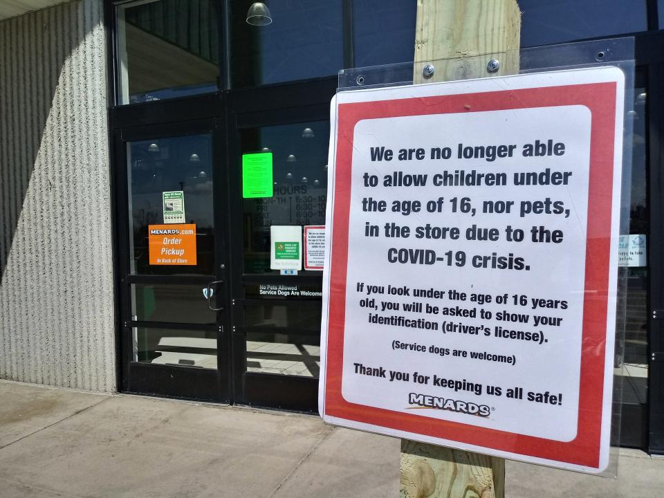 A sign relaying additional restrictions for Menards on April 2. Stores across the county have implemented different policies to promote social distancing and halt the spread of COVID-19, but officials have said it may not be enough.