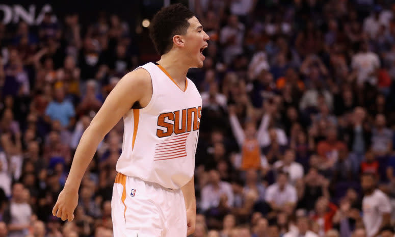 Devin Booker celebrates.