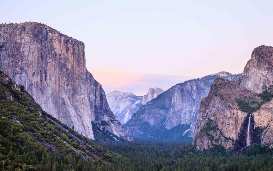 Getty Images The Yosemite Valley, with El Capitan on the left, at dawn.