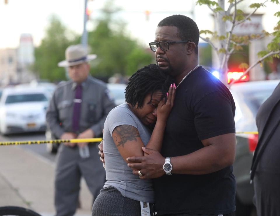 Takesha and her husband, Shawn Leonard, of Buffalo came to the Tops Friendly Market mass shooting site on May 14, 2022, in support of their neighbors and Buffalo community.