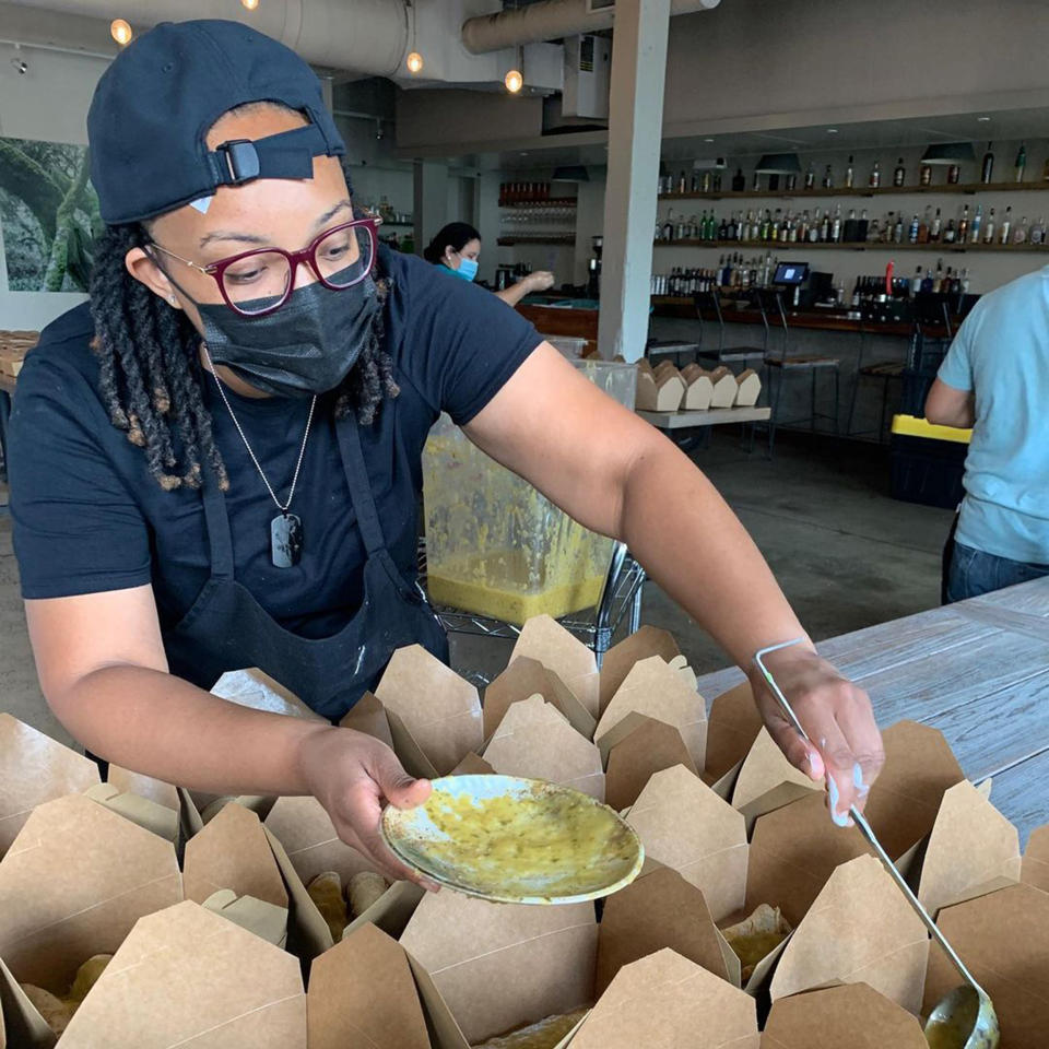 Jasmine Norton prepares and serves food at a ghost kitchen.  (Courtesy  @theurbanoyster / Instagram)