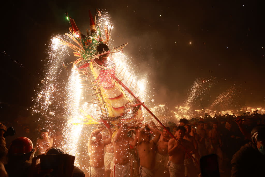 Folk artists performed the Puzhai fire dragon dance to celebrate the Lantern Festival on Feb. 24, 2024 in Meizhou, Guangdong Province of China. <span class="copyright">VCG—Getty Images</span>