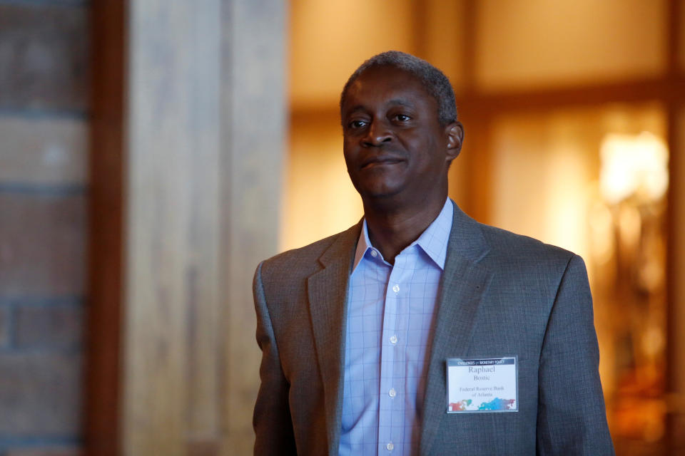 Raphael Bostic, President of the Federal Reserve Bank of Atlanta walks into the three-day 