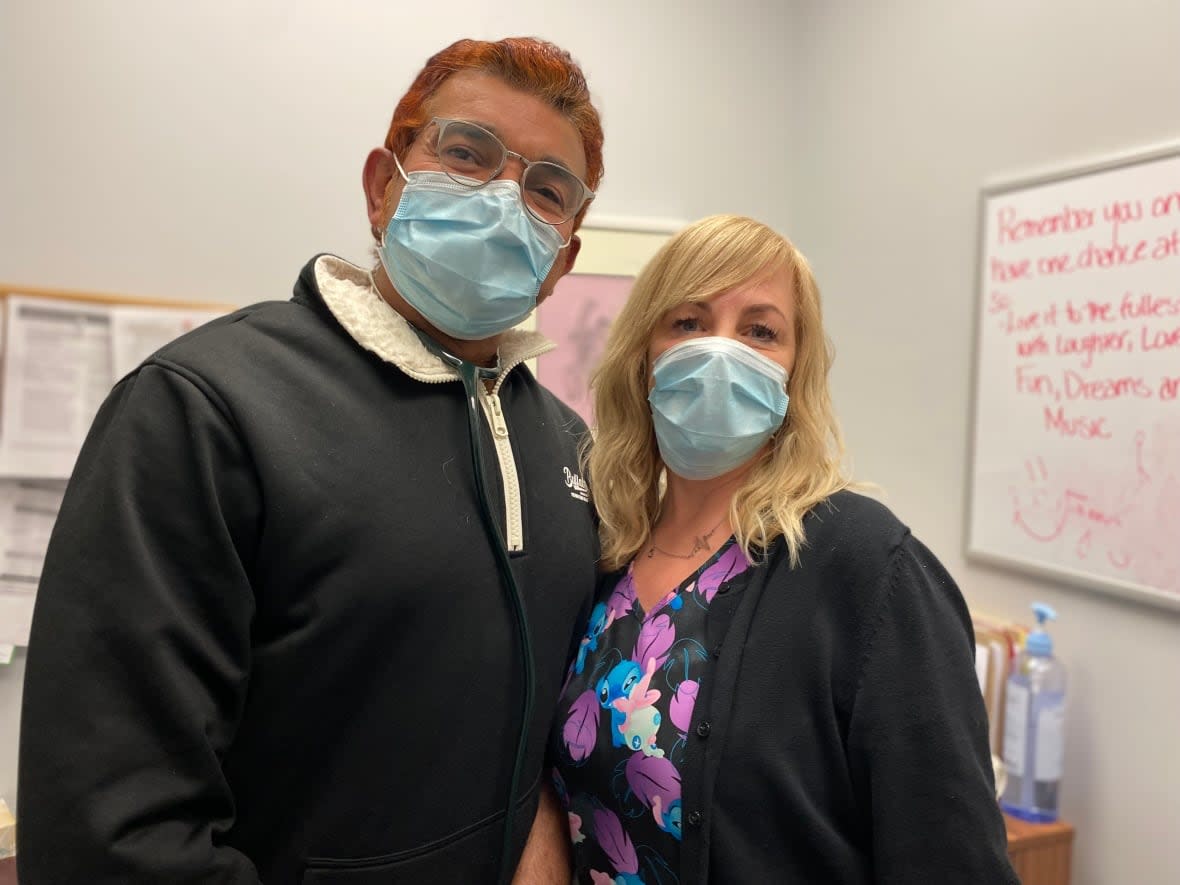 Dr. Anees Khan, left, stands next to office administrator Debbie Walsh at the Southbank Medical Clinic.  (Joseph Tunney/CBC - image credit)