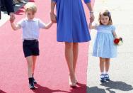 <p>The children joined their parents on their 2017 visit to Germany and Poland, with Charlotte adorably carrying a bunch of flowers after arriving at Berlin airport.</p>