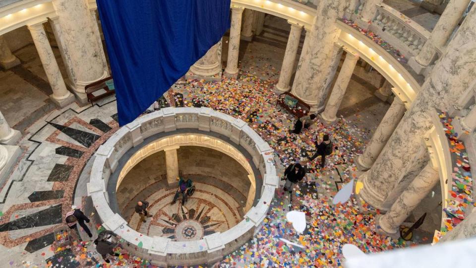 Over 48,000 handmade paper hearts are dropped from the fourth floor of the Idaho Capitol rotunda during a demonstration by members of the LGBTQ+ community, Tuesday, April 2, 2024. Approximately 48,000 people in Idaho identified themselves as LGBTQ+ on the 2020 census. Sarah A. Miller/smiller@idahostatesman.com