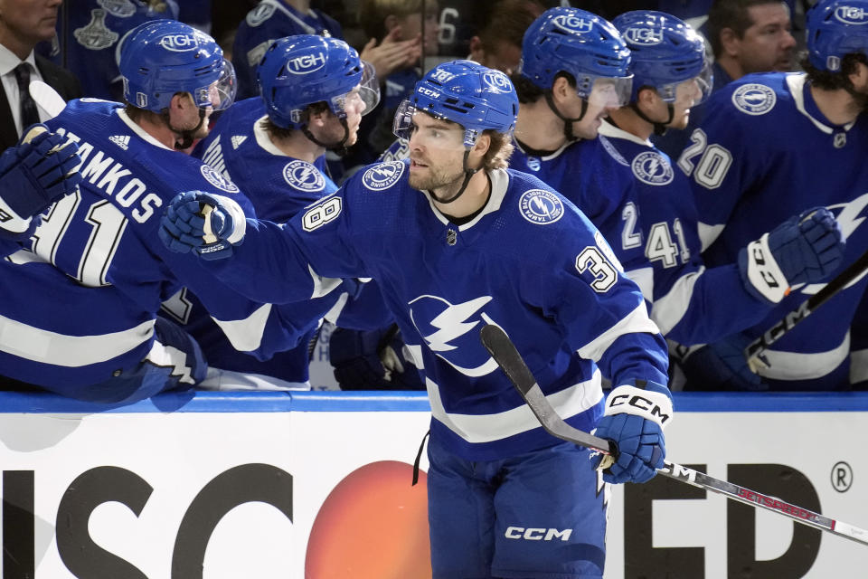 Tampa Bay Lightning left wing Brandon Hagel (38) celebrates with the bench after scoring against the Florida Panthers during the first period in Game 4 of an NHL hockey Stanley Cup first-round playoff series, Saturday, April 27, 2024, in Tampa, Fla. (AP Photo/Chris O'Meara)