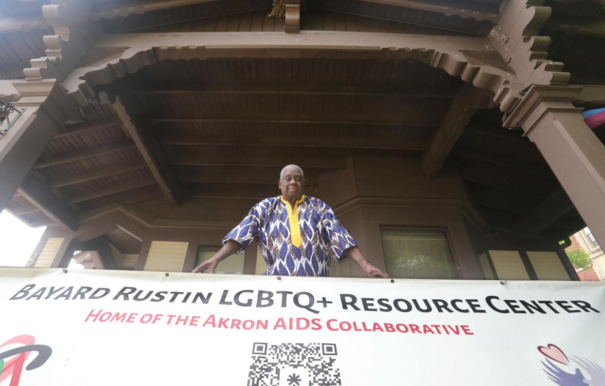 Steve Arrington, chief administrator of the Bayard Rustin LGBTQ+ Resource Center, looks out over its front porch Tuesday in Akron.
