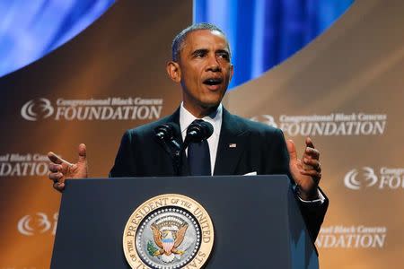 U.S. President Barack Obama delivers remarks at the Congressional Black Caucus Foundation dinner in Washington September 27, 2014. REUTERS/Jonathan Ernst