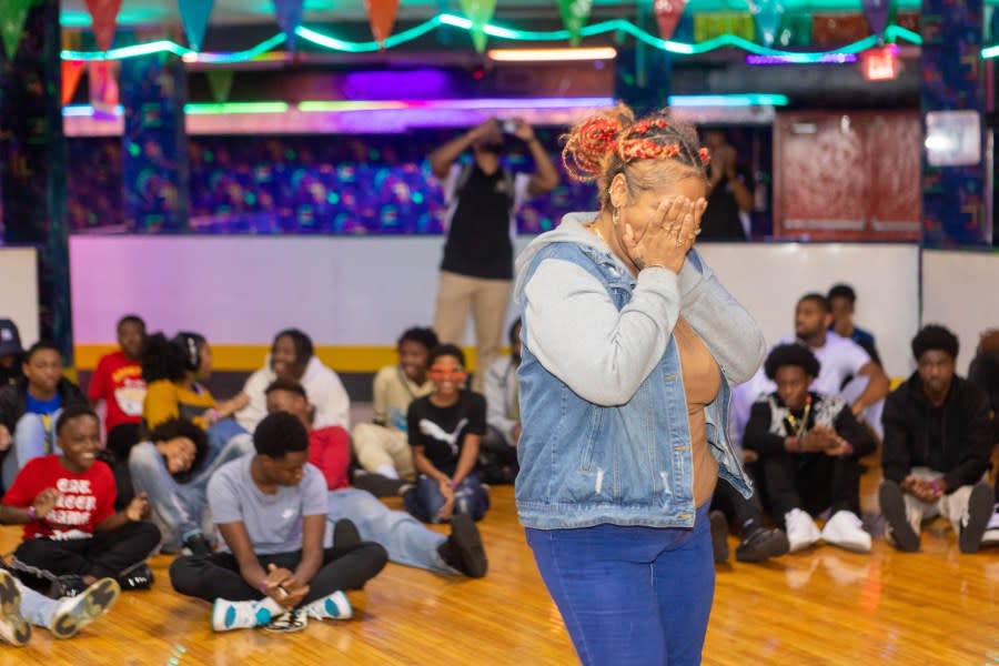 <em>A mother breaks into tears after finding out she received $5,000 from TBFF.</em> <br><em>Courtesy: Holly K Photography</em>